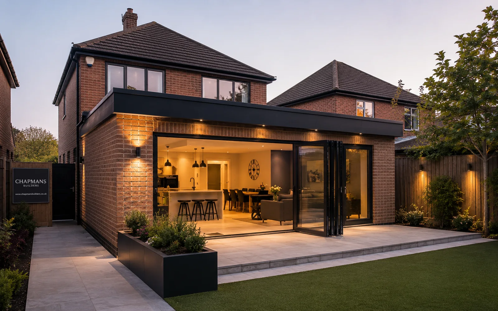 Modern home extension completed by Chapmans Builders in Romsey Hampshire featuring open plan living space and large glazed doors
