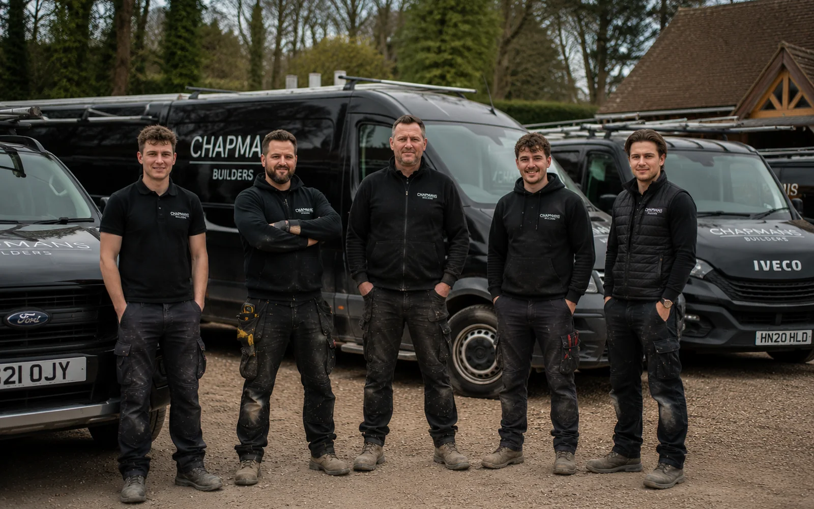Chapmans Builders team discussing a residential construction project at a Hampshire property
